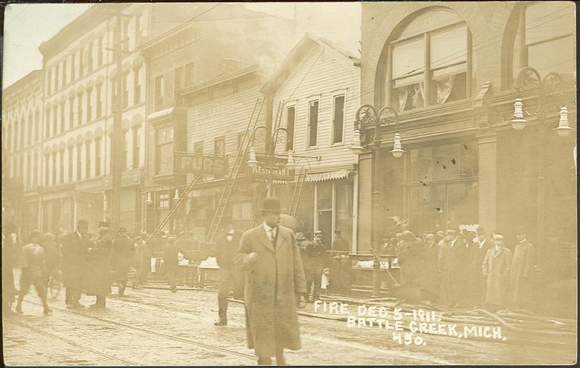 Firemen fighting a fire at 30 East Main, 1911.